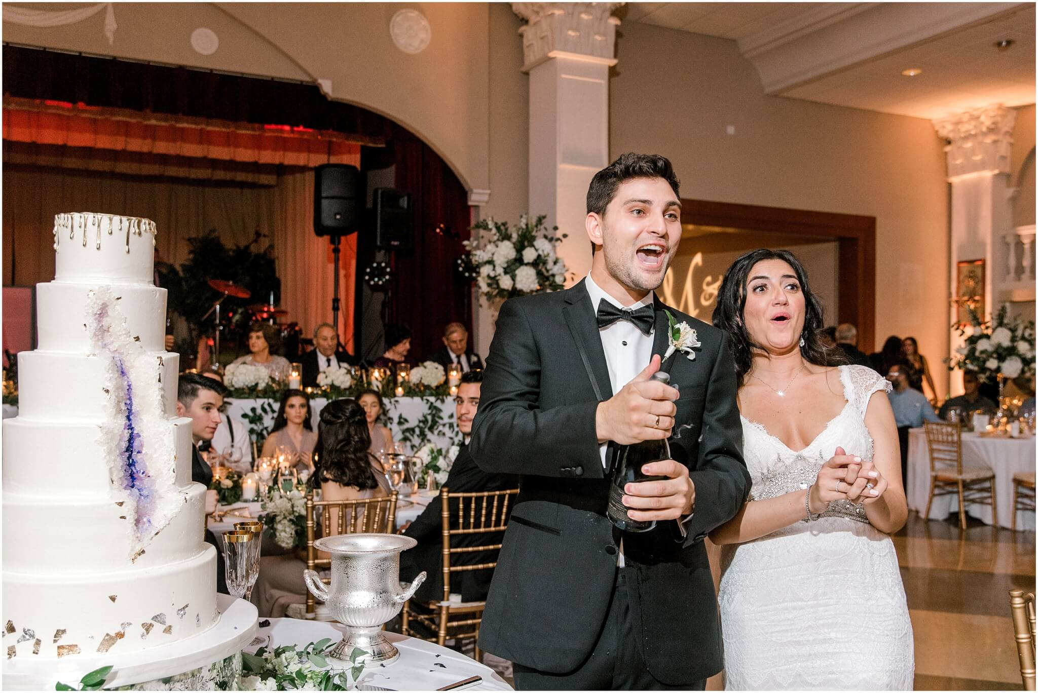 Popping champagne bottles before reception