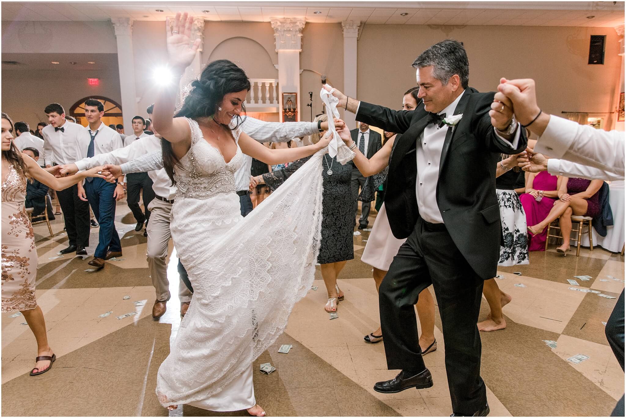 Bright dancing with dad at Greek wedding reception