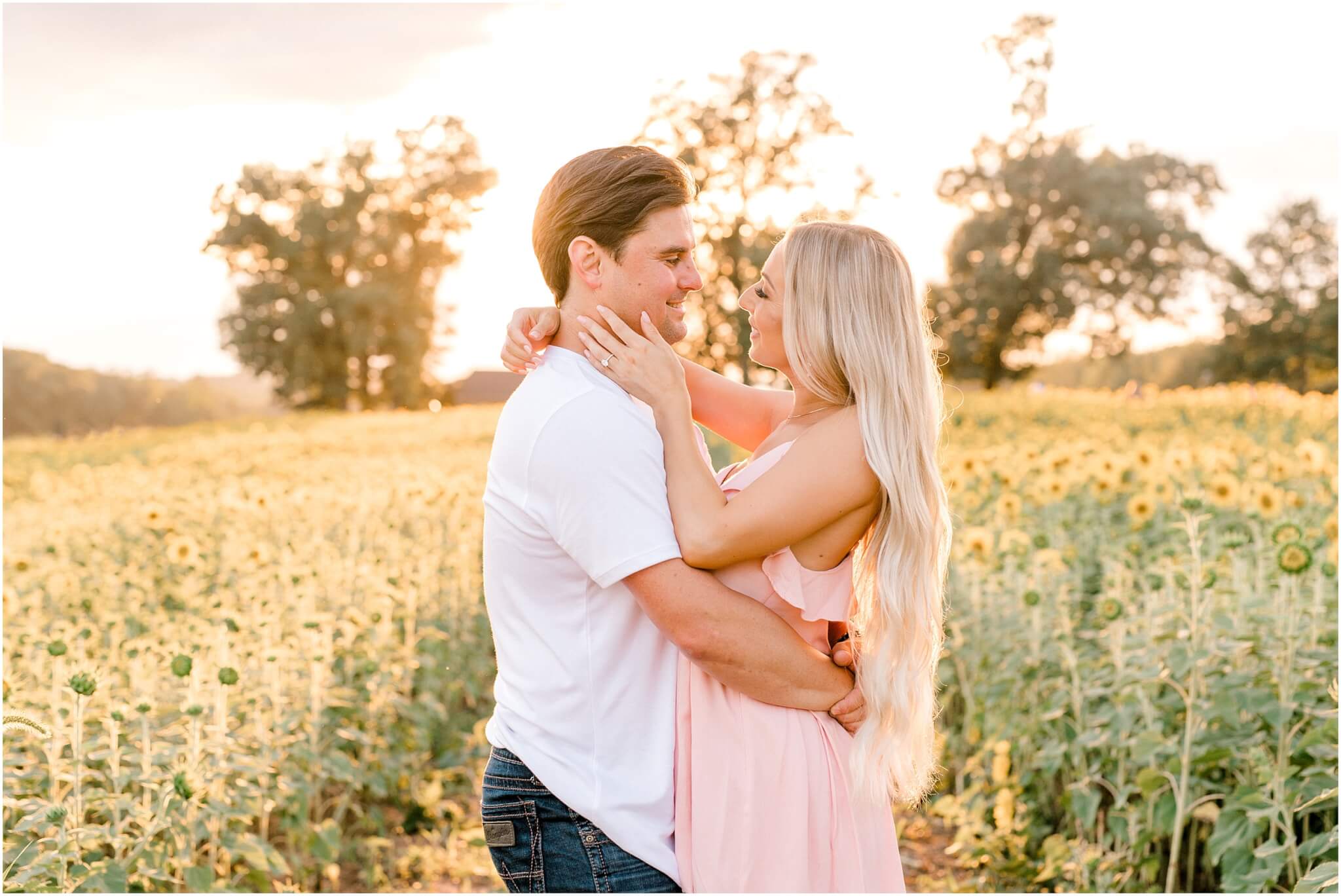 couple at golden hour in sunflower field, destination wedding photographer