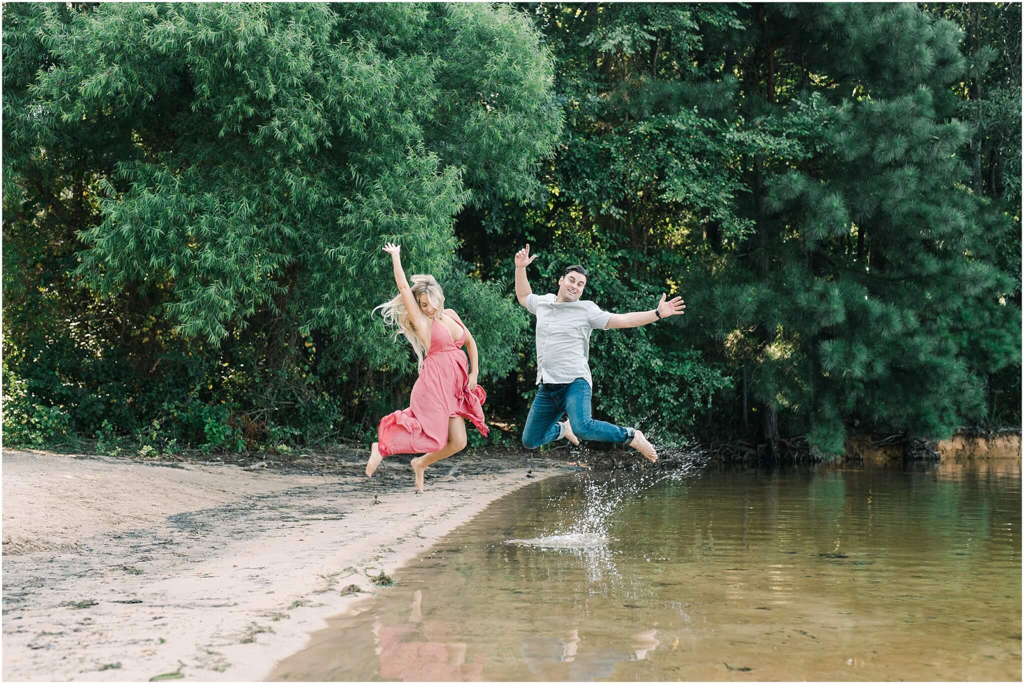 Couple jumping at the lake, charlotte engagement session