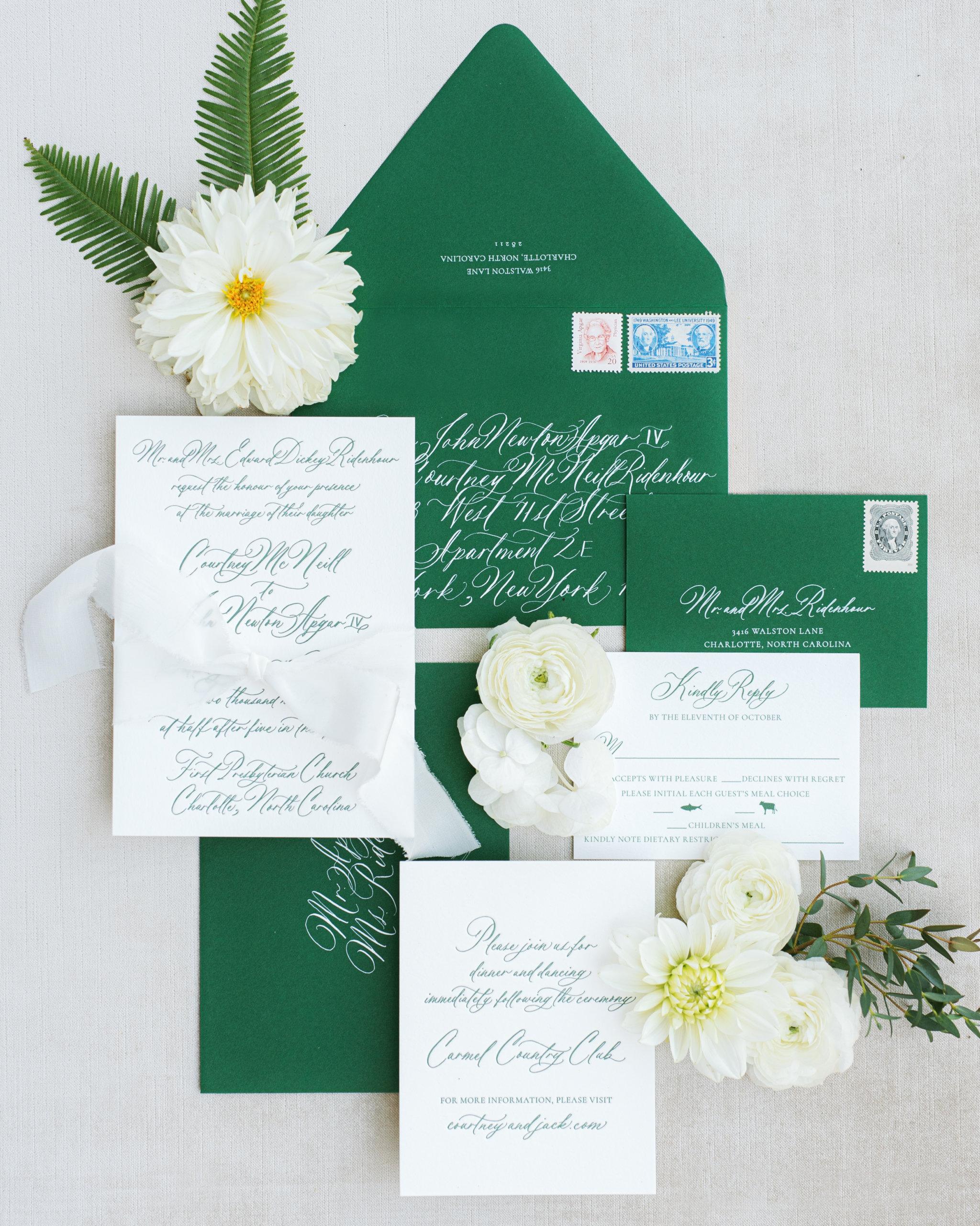 Green wedding invitation suite with white flowers