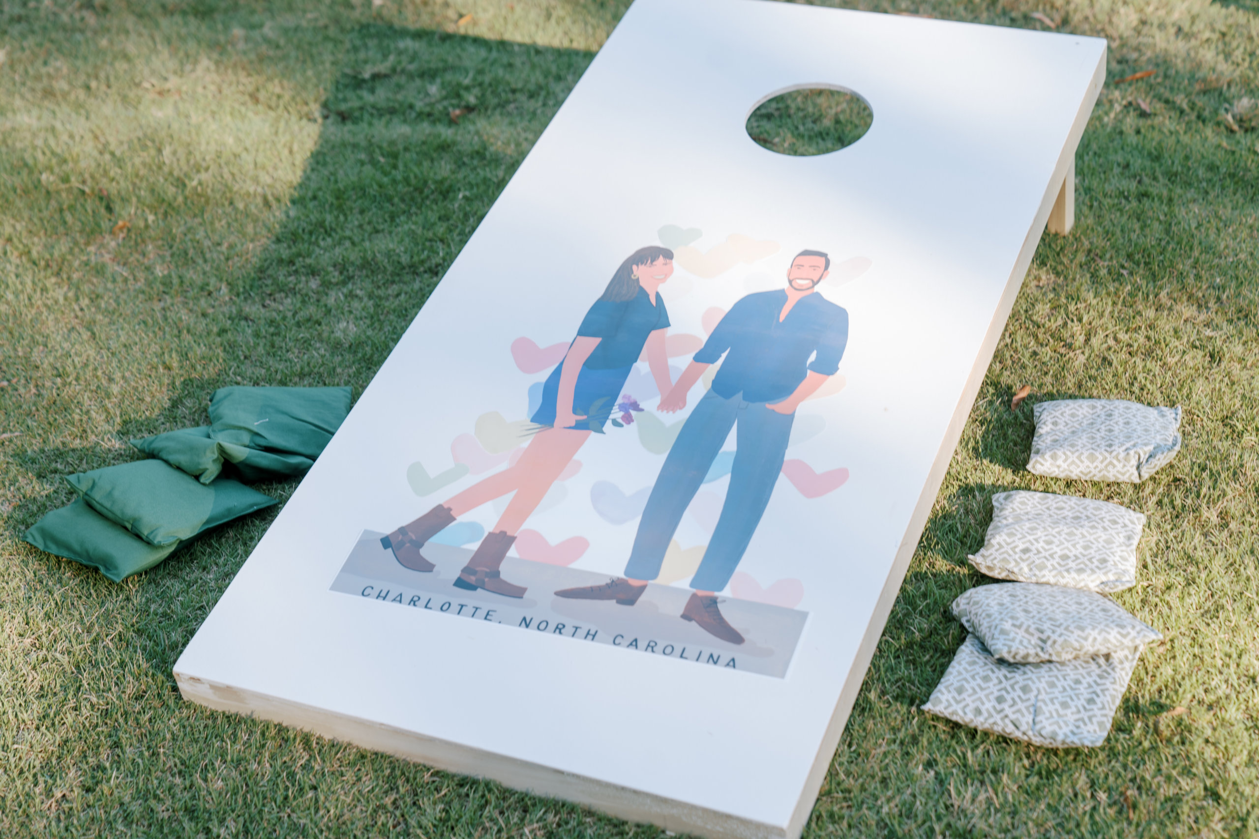 Corn hole for wedding cocktail hour
